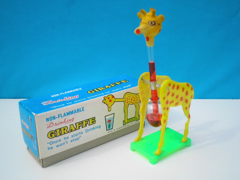 drinking giraffe